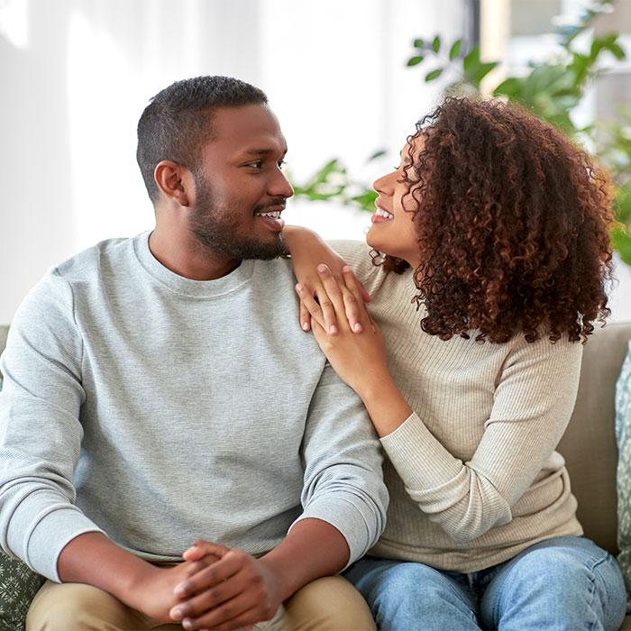 An image showcasing Yessenia Lajara, a therapist from New York, facilitating couples counseling sessions aimed at strengthening relationships and fostering greater connection and understanding between partners.