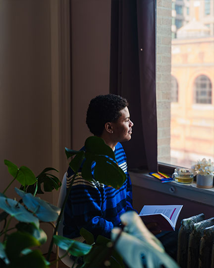 An image featuring Yessenia Lajara, a therapist from New York, utilizing a combination of yoga, Eye Movement Desensitization and Reprocessing (EMDR), and trauma therapy techniques to assist individuals in addressing and overcoming their struggles and reaching a turning point in their healing journey.